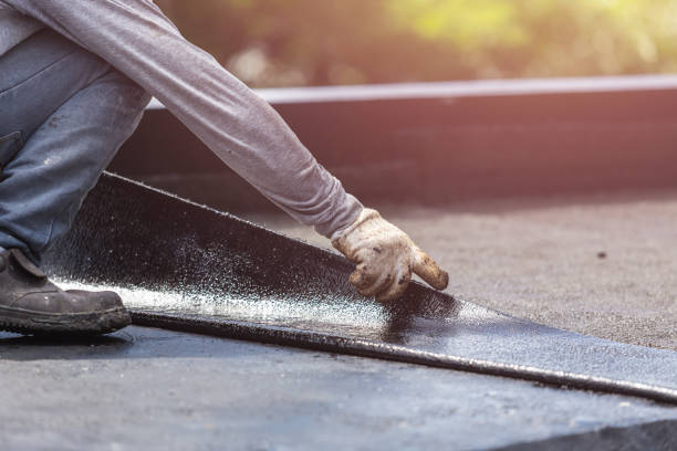 Professional Basement Waterproofing technician working in Athens, GA